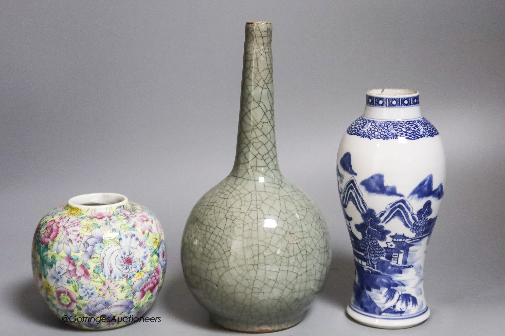 A Chinese crackleglaze bottle vase, a blue and white vase and a 'thousand flower' jar, tallest 24cm